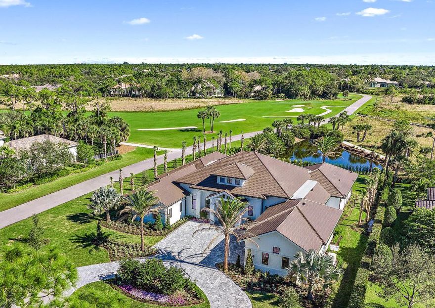 Exquisite New Construction - 4BR/5.2BA with office/den and dual master baths on an over-sized corner lot with expansive views, located in luxurious Old Marsh Golf Club.  Light and bright transitional decor with every detail imaginable: Custom 14' mahogany entry door, custom 14' sliding glass doors overlooking the pool/spa, wide-planked European white oak hardwood flooring, wine room with full wet-bar. Dream kitchen with Sub-Zero and Wolf, outdoor living with fireplace and electronic screens, summer kitchen, 3-car garage with high ceilings and doors to accommodate lifts for the car enthusiast...NO detail overlooked! A must see property, nestled within one of the finest gated golf communities in Palm Beach County. No tee times and minutes to 5-star dining, beaches and Palm Beach shopping. Old Marsh is nestled between Donald Ross Road and PGA Blvd.  No tee times, caddies and and an unparalleled level of service highlight this Emerald Award-Winning Club. Developed around the Pete Dye Championship Design, Old Marsh is an intimate and refined club limited to 275 members and 185 homes. All just 18 miles from Palm Beach International Airport.