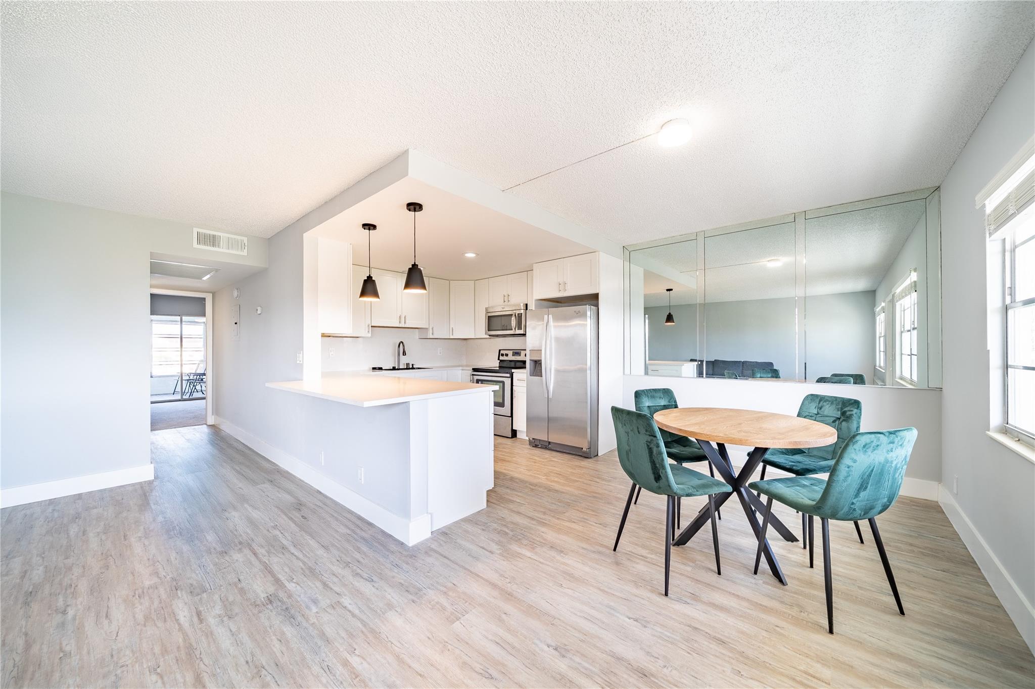 MOVE-IN -READY, Spacious residence in Yarmouth! This residence is comp a brand new kicthen , new floor a, located in Century Village, a vibrant 55+ community that offers a welcoming atmosphere and an outstanding social life. Enjoy a range of amenities, including live shows, daily movies, indoor and outdoor pools, and a state-of-the-art gym with daily classes. The apartment boasts a large living and dining area, a roomy master bedroom with an attached bath, and a versatile second bedroom ideal for an office or guest room with a high riser. The lake and nature views.