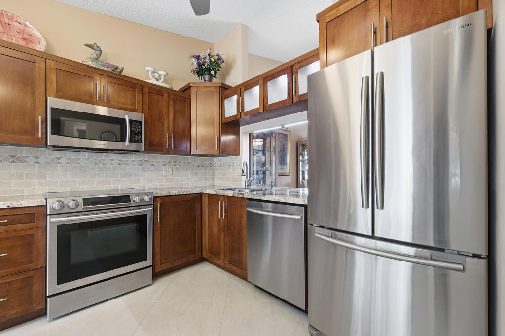 Photo of 3803 NW 35th St #1547, Coconut Creek, FL 33066 (MLS # B26001021)