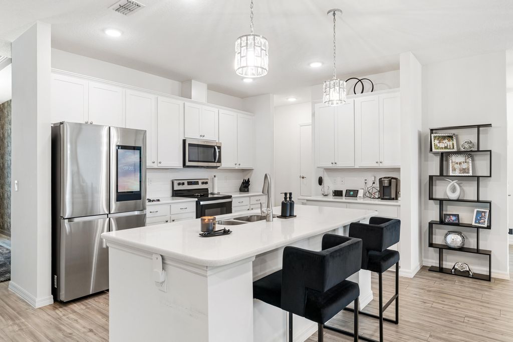 Photo of 418 SW Namoit Place, Port Saint Lucie, FL 34953 (MLS # R11120305)