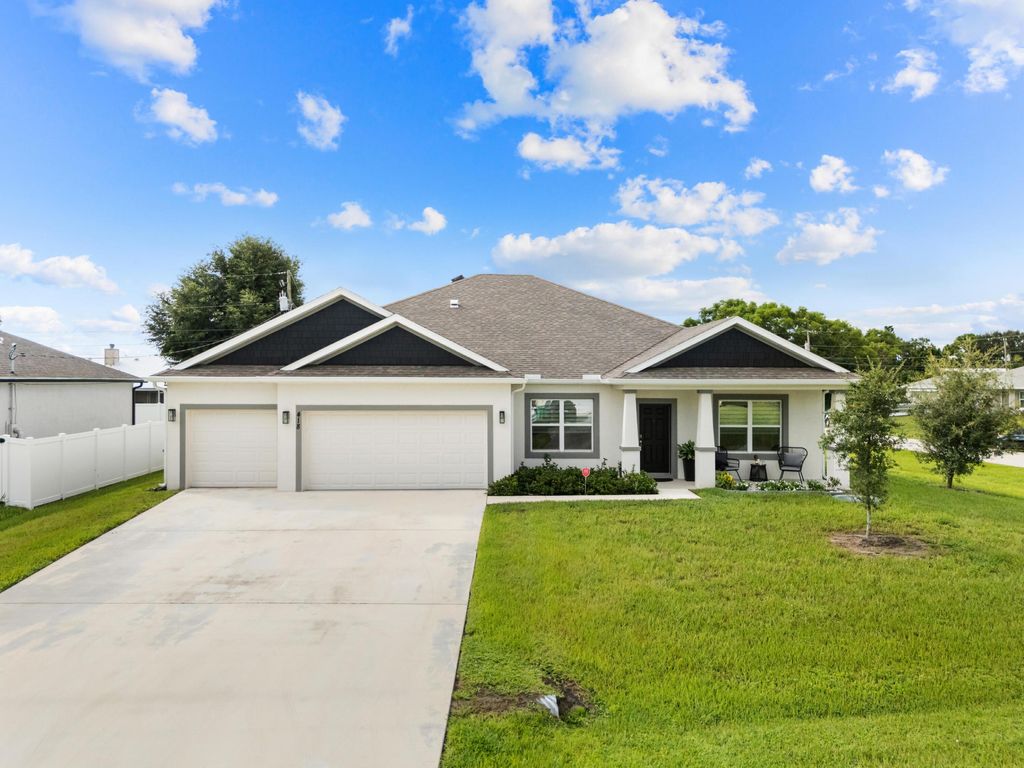 Photo of 418 SW Namoit Place, Port Saint Lucie, FL 34953 (MLS # R11120305)