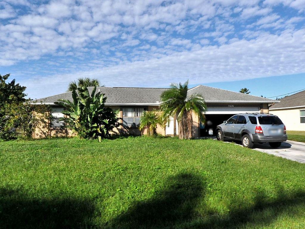 Photo of 3626 SW Rivera Street, Port Saint Lucie, FL 34953 (MLS # R10775493)