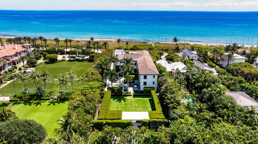 Rich elegance sets the stage 
for living by the ocean in high-style resort luxury.  Vivid ocean views backdrop this magnificent reimagined Old World estate set high on tropically landscaped, gated grounds just across from Delray Beach's dune-fringed beachfront.  Underscoring its Italian Renaissance-inspired beauty with master craftsmanship, this stately seven-bedroom palazzo has been masterfully transformed by Courchene Development. Millions of dollars have been invested in exquisite finishes to  bring this masterpiece to life. LOCATION:

410 N Ocean Boulevard, Delray Beach, Florida: Characterized by lushly landscaped well-maintained properties in a prime coastal location, Delray Beach's Segers enclave emanates an air of peaceful sophistication, an ideal choice for those seeking a tranquil yet connected lifestyle. Situated along North Ocean Boulevard, offering immediate access to pristine beaches as well as vibrant downtown Atlantic Avenue, renowned for its upscale dining, boutique shopping and cultural attractions.

PROPERTY: 
 
Gated and walled for privacy on almost an acre that is 19.5 feet above sea level, the front loggia, with a tongue-and-grove ceiling and gas fireplace, overlooks the pool courtyard. In the turf-carpeted back yard, a summer kitchen adjoins the guest house, and a pavilion views the basketball court, pickle ball court, and batting cage. 

RESIDENCE:  

Across from Delray Beach's dune-fringed oceanfront on tropically landscaped grounds that underscore Italian Renaissance-inspired architecture, this estate's rich elegance sets a prelude for coastal living in resort-inspired luxury. Reimagined by Courchene Development with no expense spared and an uncompromising eye for quality, the seven-bedroom residence spanning 13,675± square feet was thoughtfully designed to embrace breathtaking ocean vistas. Creating a dramatic first impression, a circular glass-railed staircase winds around the three-story foyer introducing the living room, appointed with a beamed ceiling, a linear gas fireplace, and a bank of French doors that open to a loggia offering views of the pool and ocean. The library, with custom built-ins, along with the dining room, also capture ocean views. The gourmet double-island kitchen is finished with custom cabinetry, a built-in buffet, marble counters, professional-grade appliances and a pantry. In a flowing open floor plan, the adjacent family room features French doors that open to the loggia and pool, inviting indoor/outdoor entertaining. Upstairs, the lavish primary suite serves as a tranquil retreat, complete with a morning bar, private ocean-view balcony, dual walk-in closets, and a spa-like marble bath fitted with double vanities, a soaking tub, a dual-head shower, and separate water closets. Two additional guest suites share a balcony, while this level also offers a massage room, theater with projector and large screen, and a laundry room. A third guest suite occupies the uppermost floor, offering exceptional privacy. The guest house comprises a first-floor club room, while two ensuite bedrooms, living room and kitchen are separate on the second floor. Overall additional details include a glass-fronted wine display, wood and porcelain-tile floors, elevator, a four-car garage, a concrete barrel-tile roof, seven-zone air-conditioning, central-vacuum system, fire-sprinkler system, full-house generator, and impact windows and doors.

The information herein is deemed reliable and subject to errors, omissions or changes without notice.  The information has been derived from architectural plans or county records. Buyer should verify all measurements.
DISCLAIMER: Information published or otherwise provided by the listing company and its representatives including but not limited to prices, measurements, square footages, lot sizes, calculations, statistics, and videos are deemed reliable but are not guaranteed and are subject to errors, omissions or changes without notice. All such information should be independently verified by any prospective purchaser or seller. Parties should perform their own due diligence to verify such information prior to a sale or listing. Listing company expressly disclaims any warranty or representation regarding such information. Prices published are either list price, sold price, and/or last asking price. The listing company participates in the Multiple Listing Service and IDX. The properties published as listed and sold are not necessarily exclusive to listing company and may be listed or have sold with other members of the Multiple Listing Service. Transactions where listing company represented both buyers and sellers are calculated as two sales. "No payments made until title passes" Some affiliations may not be applicable to certain geographic areas. If your property is currently listed with another broker, please disregard any solicitation for services. Information published or otherwise provided by seller, listing company or its representatives is deemed reliable but are not guaranteed and subject to errors, omissions, or changes without notice. Copyright 2025 by the listing company. All Rights Reserved.