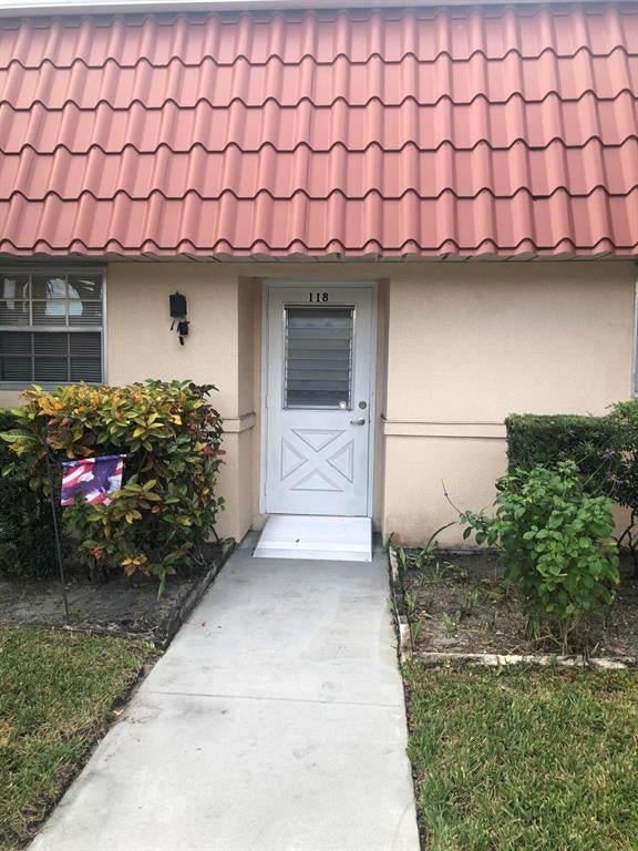 Photo of 118 Amherst Lane Ln, Lake Worth, FL 33467 (MLS # R10677979)