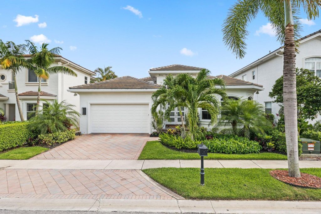 Photo of 4110 NW Briarcliff Circle, Boca Raton, FL 33496 (MLS # R11104229)