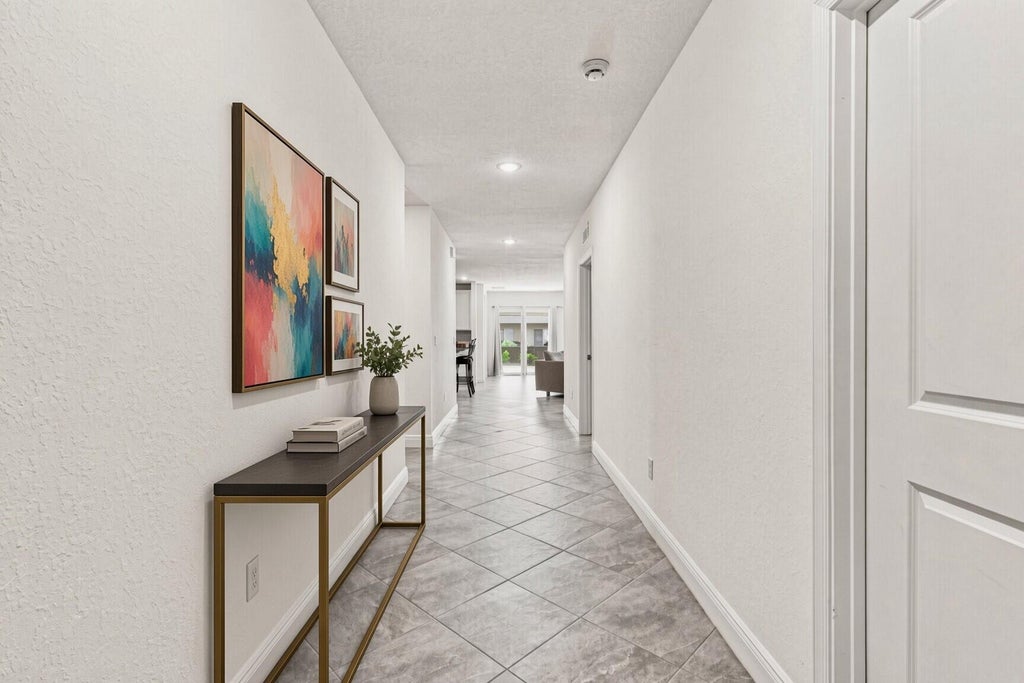Photo of 226 SW MILBURN Circle, Port Saint Lucie, FL 34953 (MLS # B26079422)