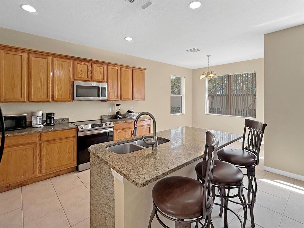 Photo of 391 Gazetta Way, West Palm Beach, FL 33413 (MLS # R11081216)