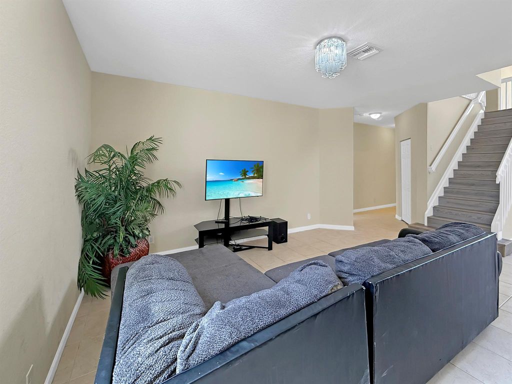 Photo of 391 Gazetta Way, West Palm Beach, FL 33413 (MLS # R11081216)