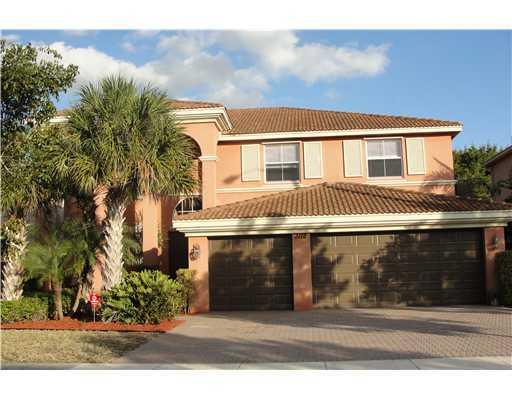 Location! Bright large hoe sit at quite street. 5/3/3 Car garages/Upgraded kitchen w/granite/crown molding/new cook top/new dishwasher/new hot water heater/first floor bedroom/full bath!Olympia great resort life style/A rated school/club house/pool/spa/tennis/basketball/mall/shopping/all within 10 minutes commuter.