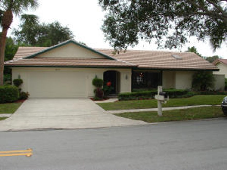 This CBS home has been completely remodeled.  New Kitchen Cabinets, New Granite Countertops.  All New GE Stainless Steel Appliances.  Both bathrooms have also been remodeled with Granite and Marble Contertops.  Professionaly landscaped and is irrigated from the lake ot back.  This home is on a Cul-de-Sac and has a large screened in Pool and Patio.  New upgraded Pergo Wood Floors thru out the Open Area and new plush carpeting in the 4 bedrooms.  It has Cathedral Ceilings, Fireplace and French Doors leading out to the Screened in outdoor space.  Large laundry room with new Utility Sink and has as additional 9 feet of closets. Oversized 2 car garage.    Tile roof is 9 years old and the A/C is less than a year old. All of our schools, Elementary, Middle,and High School are A-Rated. Owner/Agent