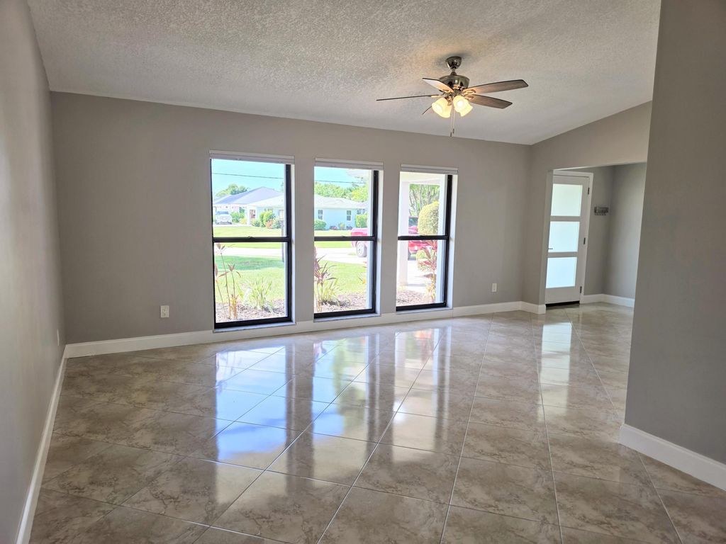 Photo of 1602 SE Holiday Road, Port Saint Lucie, FL 34952 (MLS # R11106851)