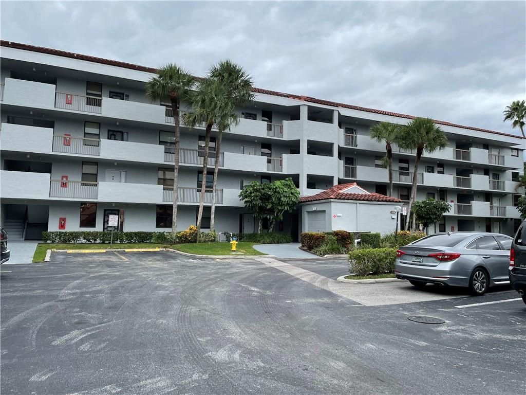 Photo of 4132 Carambola Cir S Cir #F103, Coconut Creek, FL 33066 (MLS # F10350321)