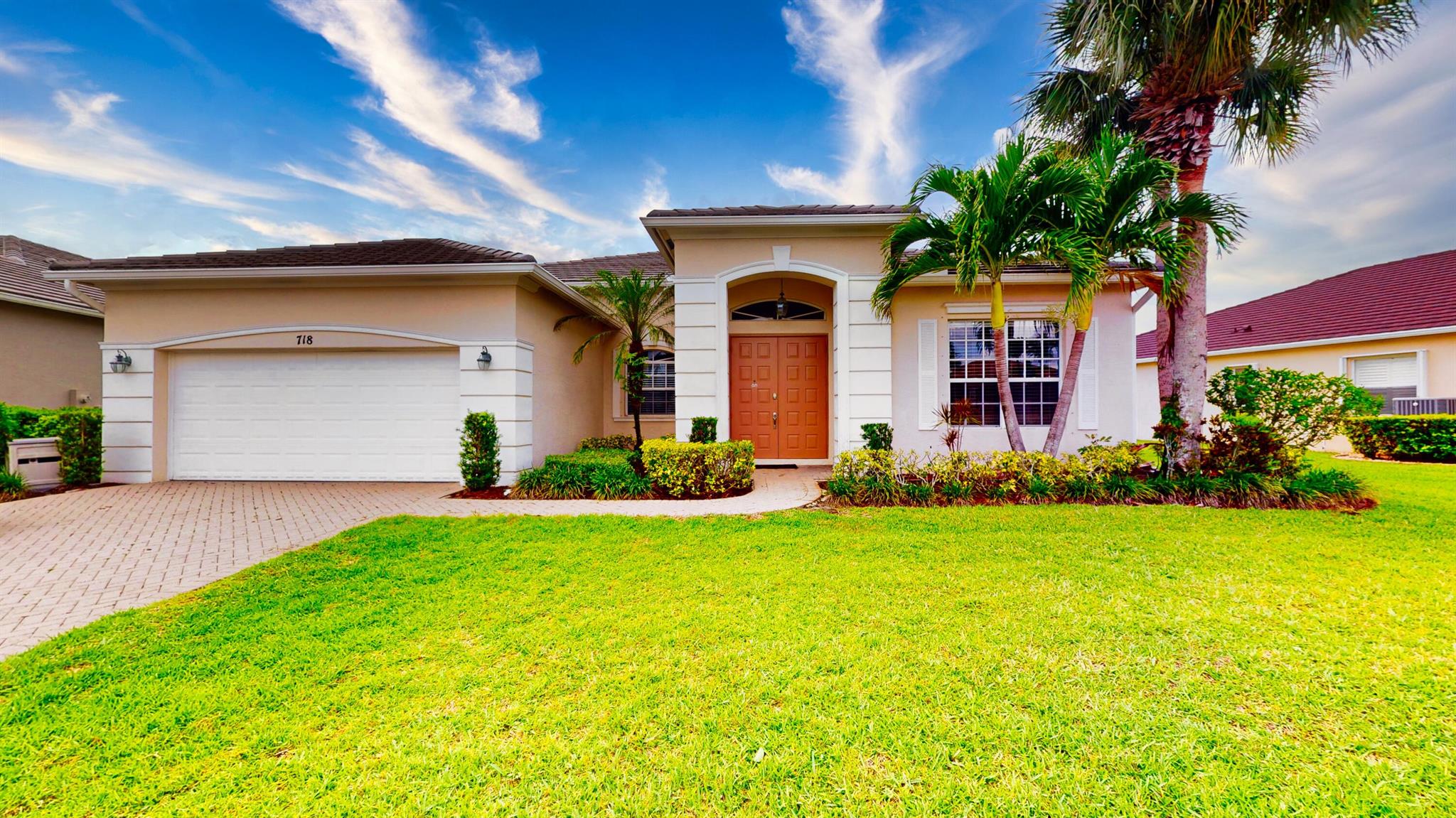 Nestled in the heart of the sought-after, family-friendly community of Lake Forest in Port Saint Lucie, 718 SW Myakka River Trace is a beautifully maintained 3-bedroom, 2-bathroom home with a versatile den and an inviting open floor plan. As you enter through elegant double entry doors, you're welcomed into a spacious layout that features a formal living and dining area, as well as a cozy family room perfectly positioned off the upgraded kitchen. The kitchen is a chef's delight, boasting 42-inch cabinets, stunning countertops, and a built-in shelved pantry that offers ample storage. The oversized master suite is a true retreat, complete with a large walk-in closet, dual sinks, a walk-in shower, and a relaxing soaking tub.