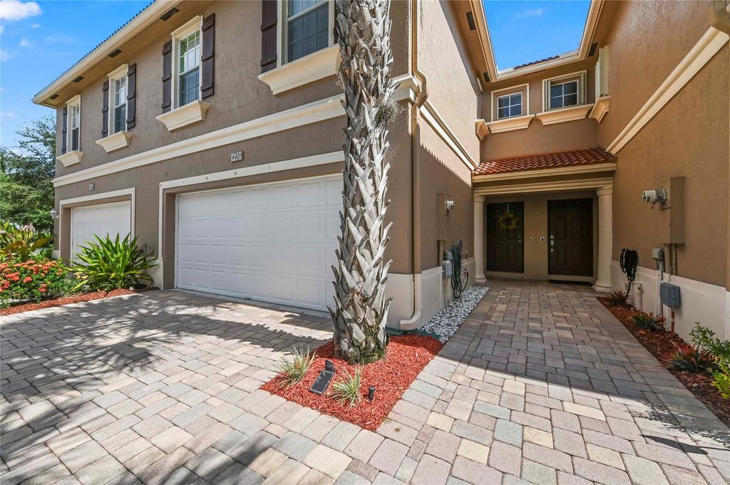 Photo of 4405 Macarthur Palm Trail #4505, Greenacres, FL 33463 (MLS # F10520399)