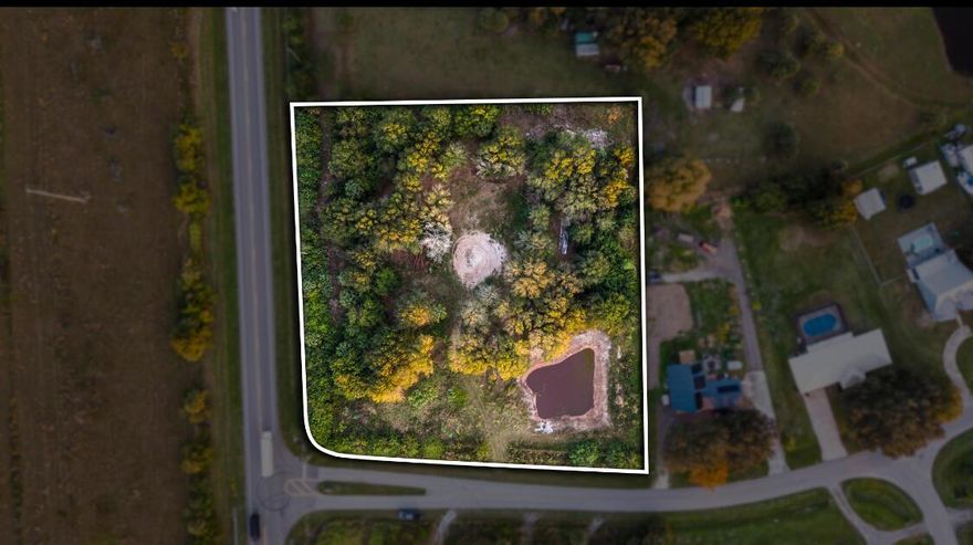 2+ ACRES SW section of Okeechobee. Build your dream home BARNOMINIUMN with the 60x80 metal building, two-tone dark gray/light gray in color, 4/12 roof 2' eves. Engineered house plans included with the purchase of the land for a 5 bedrooms, 5 and half Baths, two-story home with game room, theater, 2400 sq ft shop/garage. 3600 sq ft living. Partially fenced, culverts placed.