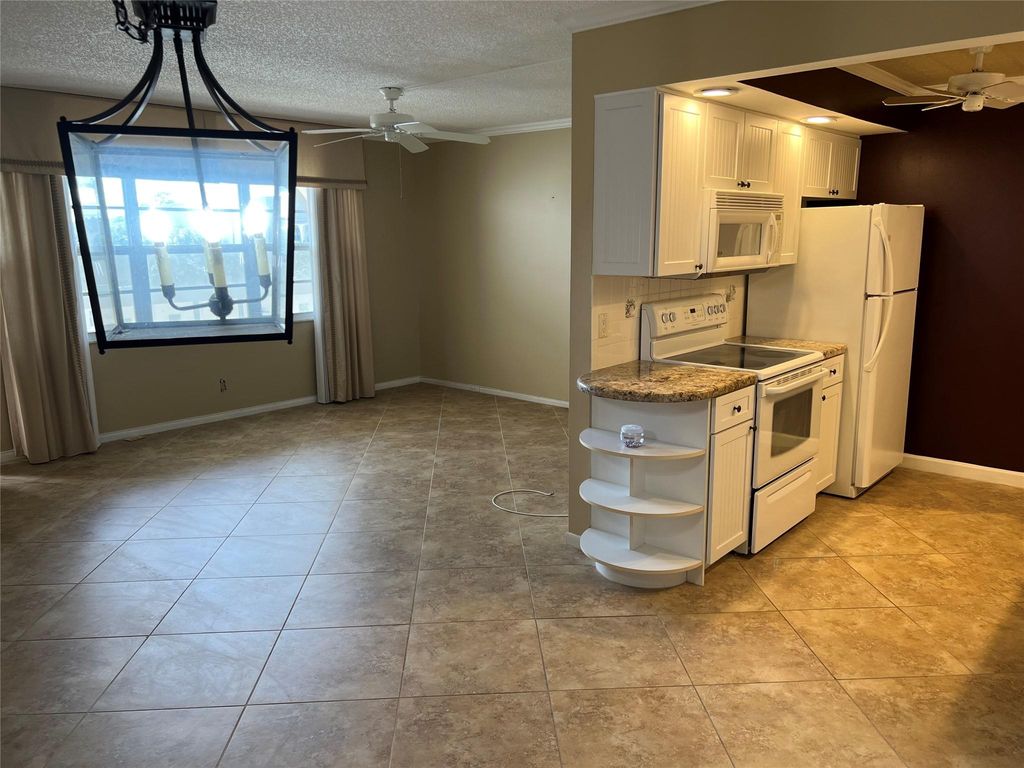 Photo of 4701 Martinique Dr #F4, Coconut Creek, FL 33066 (MLS # F10415415)