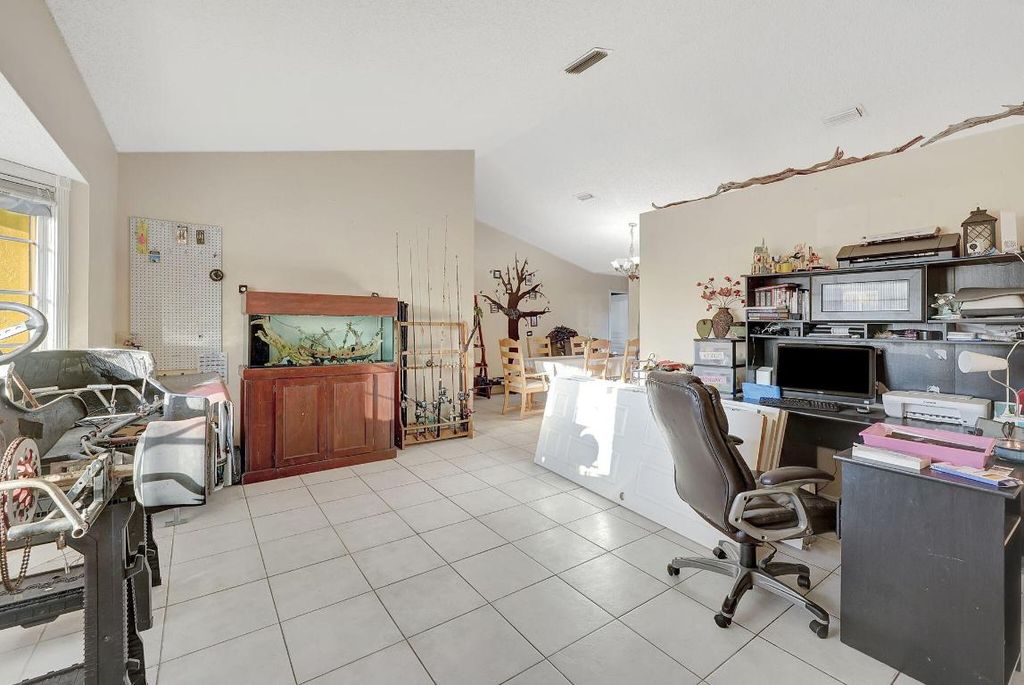 Photo of 3617 SW Masilunas Street, Port Saint Lucie, FL 34953 (MLS # R11156522)