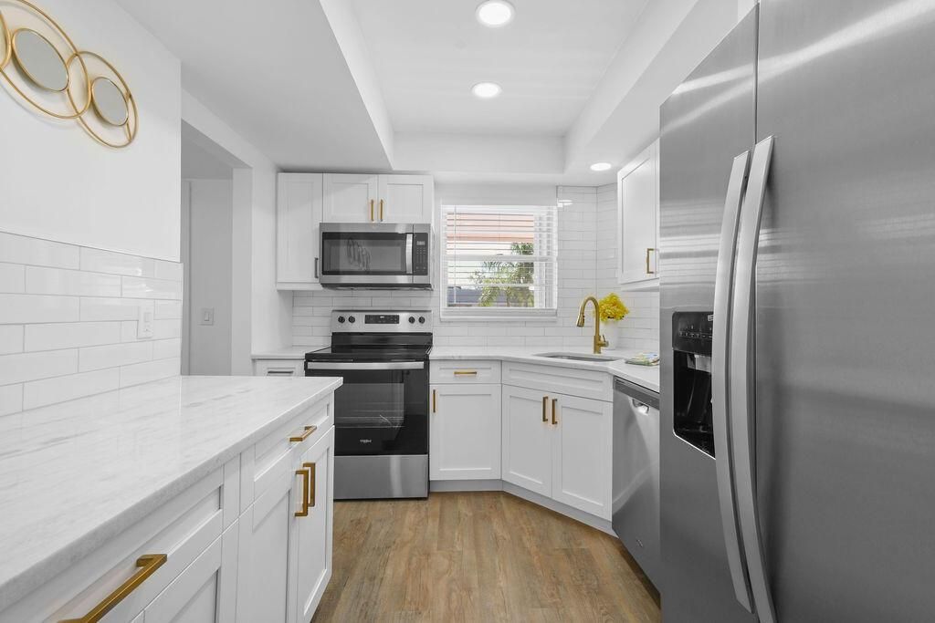 Photo of 18081 SE Country Club Drive Dr #1-8, Jupiter, FL 33469 (MLS # R10823515)