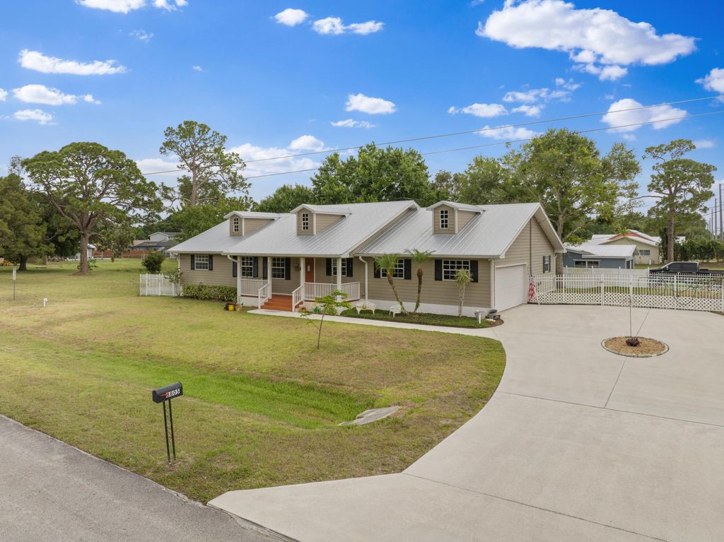 Photo of 8805 Coquina Avenue, Fort Pierce, FL 34951 (MLS # R10989384)