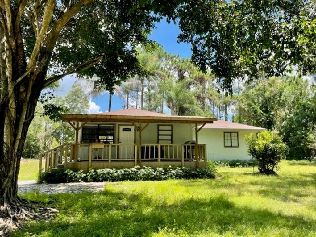 Photo of 16301 134th Terrace Ter N, Jupiter, FL 33478 (MLS # R10826543)