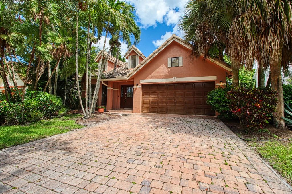 Photo of 6310 NW 58th Way, Parkland, FL 33067 (MLS # F10403436)