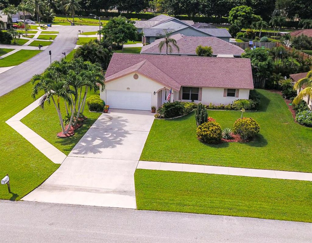 Photo of 7656 Birch Tree Terrace Ter, Lake Worth Beach, FL 33467 (MLS # R10822559)