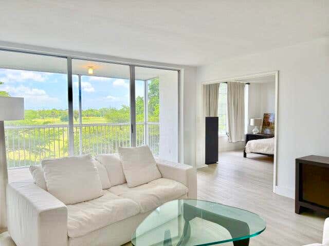 Photo of 3080 N Course Drive #407, Pompano Beach, FL 33069 (MLS # B26063575)