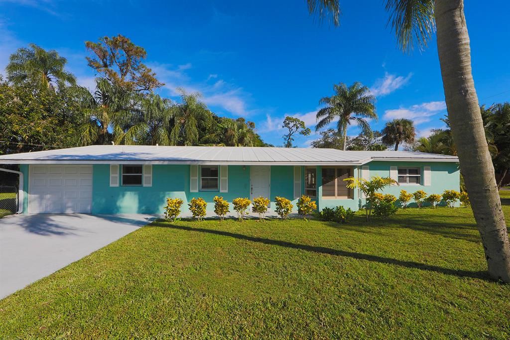 Photo of 3085 SW Feroe Avenue, Palm City, FL 34990 (MLS # R10678742)