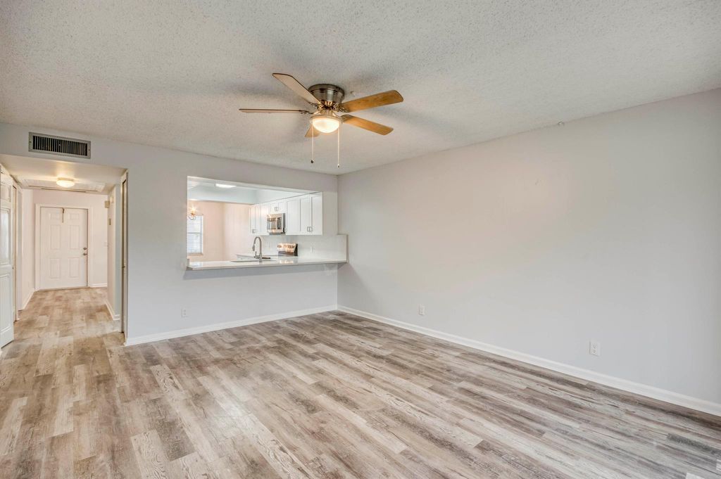 Photo of 3111 Gardens East Drive #31, Palm Beach Gardens, FL 33410 (MLS # R11103728)