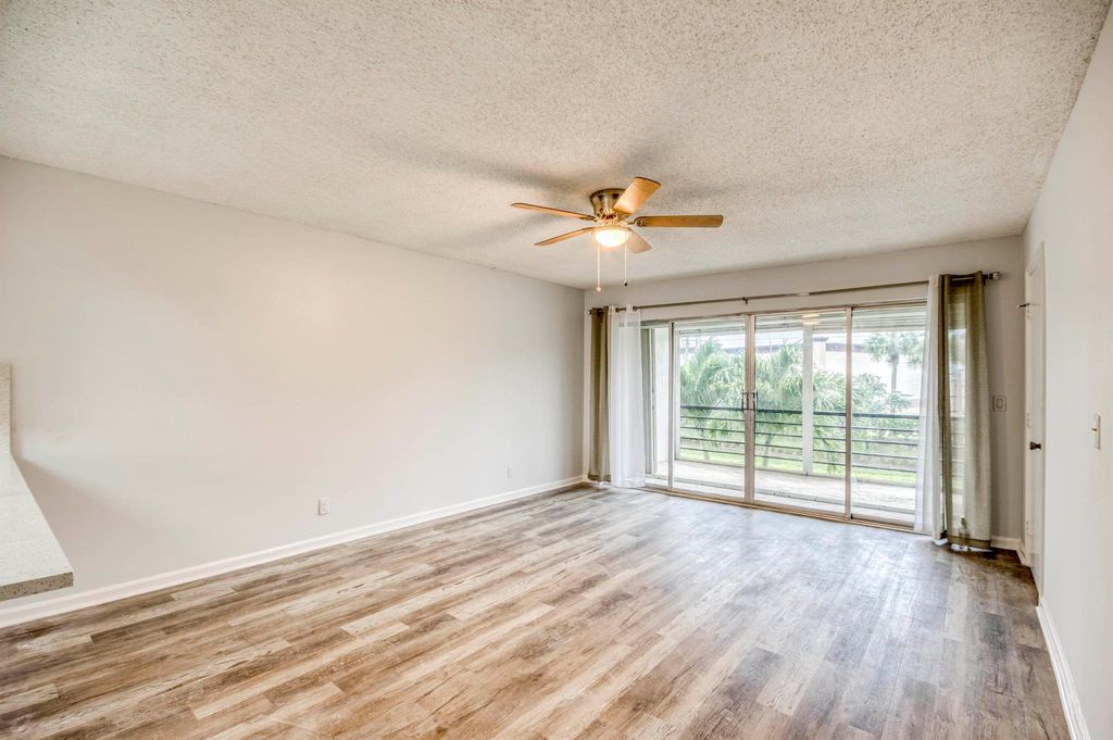 Photo of 3111 Gardens East Drive #31, Palm Beach Gardens, FL 33410 (MLS # R11103728)