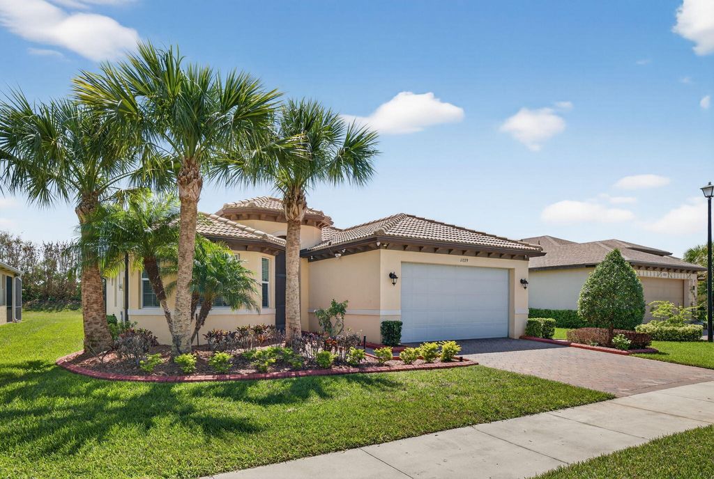 Photo of 11379 SW Lake Park Drive, Port Saint Lucie, FL 34987 (MLS # B26009534)