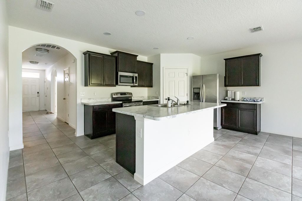 Photo of 1219 SW Patricia Avenue, Port Saint Lucie, FL 34953 (MLS # R11144098)