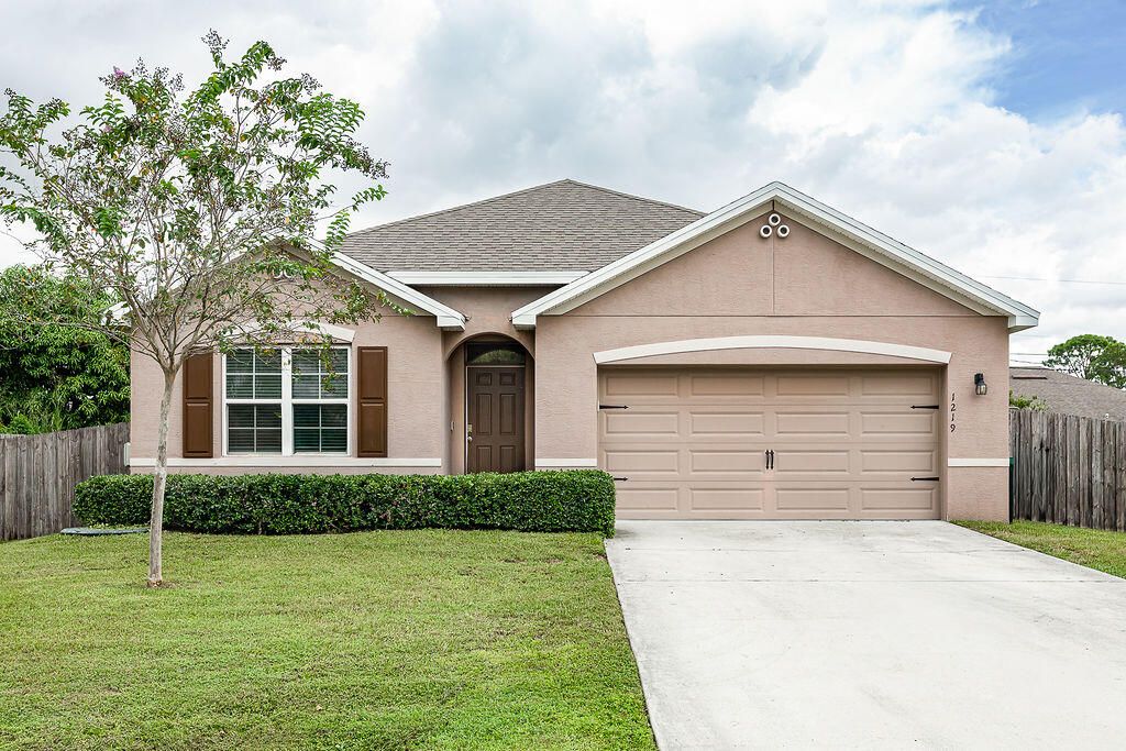 Photo of 1219 SW Patricia Avenue, Port Saint Lucie, FL 34953 (MLS # R11144098)