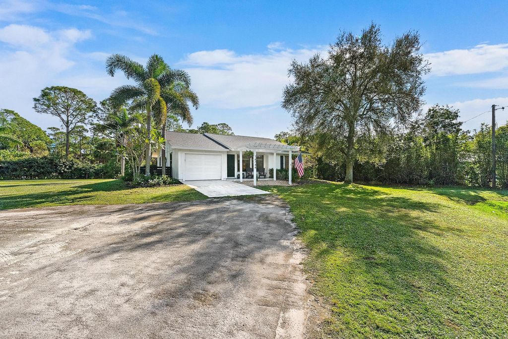 Photo of 16766 123rd Terrace N, Jupiter, FL 33478 (MLS # R11149898)