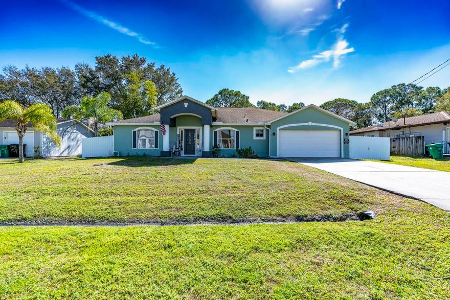 This beautifully updated 4-bedroom, 2-bathroom CBS home, built in 2006, offers modern style & a prime location in the heart of Port St. Lucie. Designed w/ a contemporary grey & white color palette, the home features tile flooring throughout & an open, split floor plan that enhances space & functionality. The updated kitchen boasts white cabinetry, granite countertops, a spacious island, & stainless steel appliances, making it perfect for cooking & entertaining. The large master suite includes a walk-in closet & an updated en-suite bath w/ a granite vanity, dual shower heads. The second bathroom has also been tastefully upgraded. Additional features include newer fans & lighting throughout, and 2022 AC unit. Call us today for a private tour!