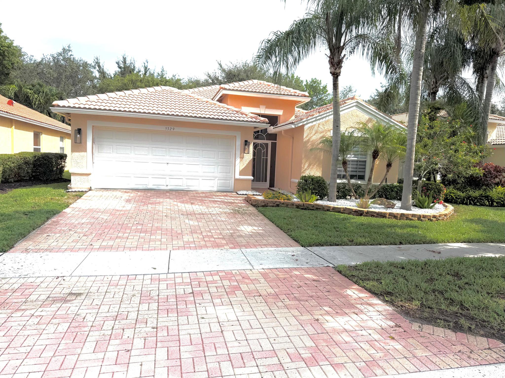 A PICTURE PERFECT PRETTY HOME WITH ALL UPGRADES. SURROUNDED BY LUSH LANDSCAPING AND EXOTIC GREENERY MAKES YOU FEEL ''AT HOME''. ALL NEW APPLIANCES, A/C 23', DESIGN FIXTURES, FANS, UPDATED BATHROOMS, LED LIGHTING, FRESHLY PAINTED, FRESHLY STEAMED AND REGROUTED TILE, NO CARPET, WALK IN CLOSETS, ETCHED GLASS FRONT DOOR FOR NATUAL LIGHT,EPOXY GARAGE FLOOR, PLENTY OF STORAGE SPACE. DECORATE EASILY WITH THESE NEUTRAL COLORS. OPEN FLOOR PLAN MAKES IT EASY FOR ENTERTAINING. TUSCANY BAY IS AN ACTIVE 55+ PET FRIENDLY COMMUNITY. PLENTY OF AMENITIES TO KEEP YOU BUSY. ENJOY ALL THE CLUBS, PARTIES, SHOWS, EVENTS, CARDS, GYM, EXERCISE CLASSES, BARBEQUES, PICKLE BALL, TENNIS, BOCCE BALL. FRINDLY & SOCIAL. LOCATED NEAR ALL BEACHES, SHOPPING, RESTAURANTS & HIGHWAYS. BOOK YOUR SHOWING TODAY.