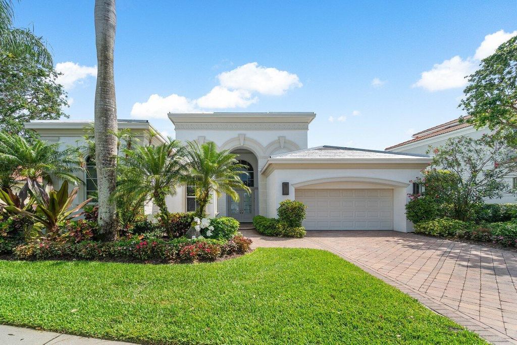 Photo of 104 Monte Carlo Drive, Palm Beach Gardens, FL 33418 (MLS # R10973389)