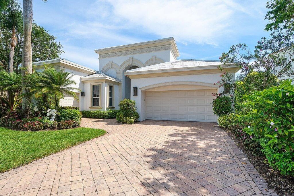 Photo of 104 Monte Carlo Drive, Palm Beach Gardens, FL 33418 (MLS # R10973389)