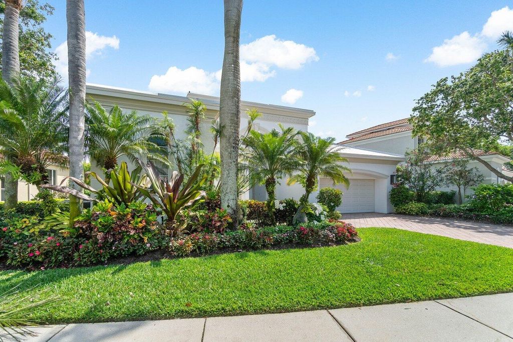 Photo of 104 Monte Carlo Drive, Palm Beach Gardens, FL 33418 (MLS # R10973389)