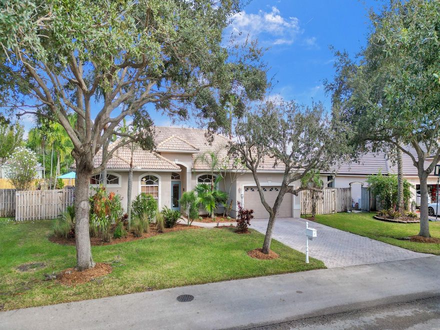 Expansive and spacious 4 BR  2.5 BTH pool home on oversized wide fenced lot. Double front doors lead to foyer entry with dramatic volume ceilings. Classic layout w large living areas, timeless &  authentic glazed Mexican tile throughout. Featuring formal living & dining, big kitchen w café nook, extended wood cabinets w plenty of counter space and large family room. Big Master Suite & bath w separate tub & shower, walk-in closet, bedroom 4 or den adjacent to Master. Good sized Bedrooms 2 & 3 w adjacent cabana bath leading to pool and patio. French doors to patio from family room & Master. True backyard oasis featuring an extended covered patio and tropically landscaped heated pool and grounds.  Great small gated community w low HOA dues within walking distance to top rated elementary.