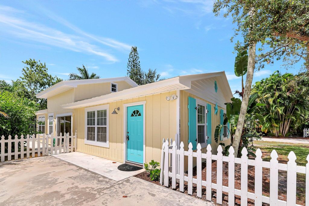 Photo of 1017 SW Spruce Street, Palm City, FL 34990 (MLS # R10998078)
