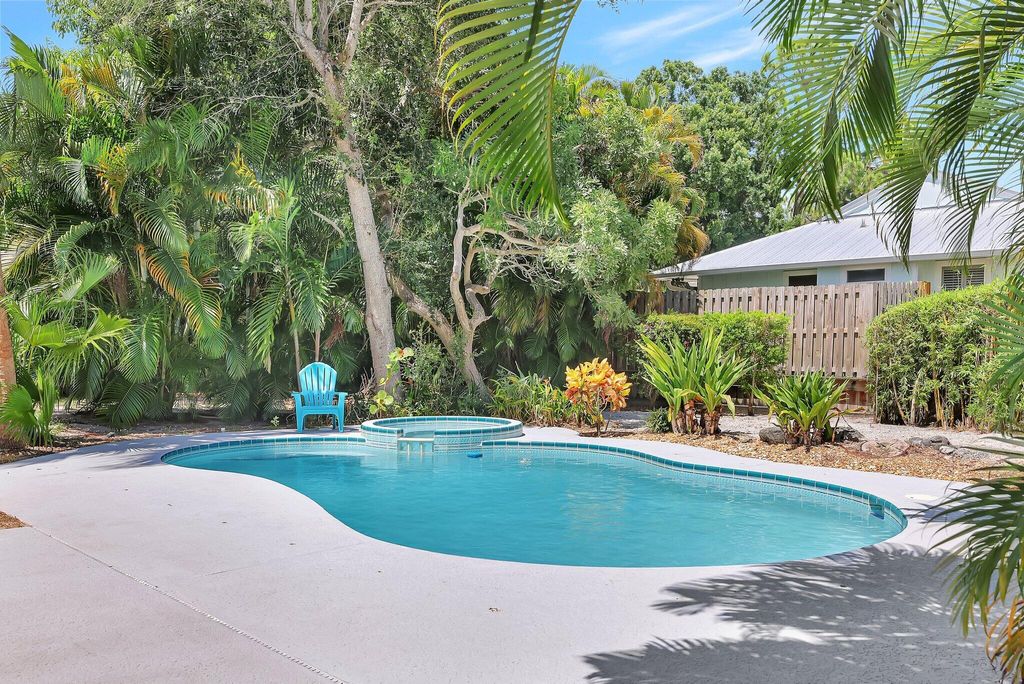 Photo of 1017 SW Spruce Street, Palm City, FL 34990 (MLS # R10998078)
