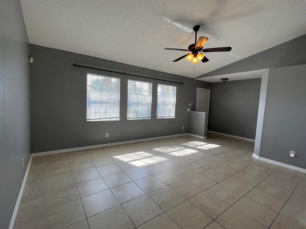 Photo of 1841 SW Angelico Lane, Port Saint Lucie, FL 34984 (MLS # R11070737)