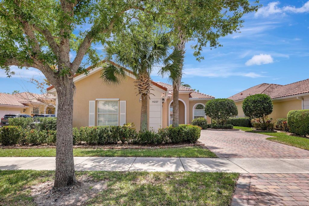 Photo of 11237 SW Northland Drive, Port Saint Lucie, FL 34987 (MLS # R10979335)