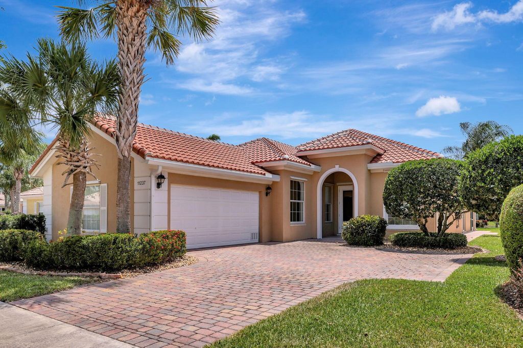 Photo of 11237 SW Northland Drive, Port Saint Lucie, FL 34987 (MLS # R10979335)