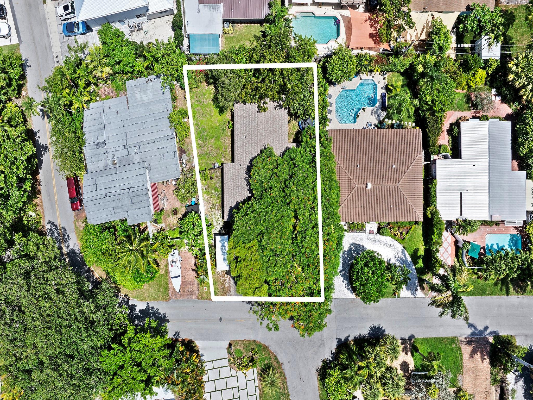 Are you ready to build your dream home or embark on your next spec project? This exceptional 7,876-square-foot lot (70' x 101 x 88 x 100) is the perfect canvas for your vision! Located in Lauderdale Harbors/Cliff Lake, one of Fort Lauderdale's most sought-after neighborhoods, this property offers unparalleled convenience and lifestyle. Located just minutes from the beach, picturesque neighborhood parks, vibrant Las Olas Boulevard, stunning beaches, and Fort Lauderdale-Hollywood International Airport, you’ll be at the heart of everything this vibrant city has to offer. Opportunities like this are rare—don’t miss your chance to claim a slice of paradise. Whether you’re building your dream home or your next project, this lot is ready to make your vision a reality!