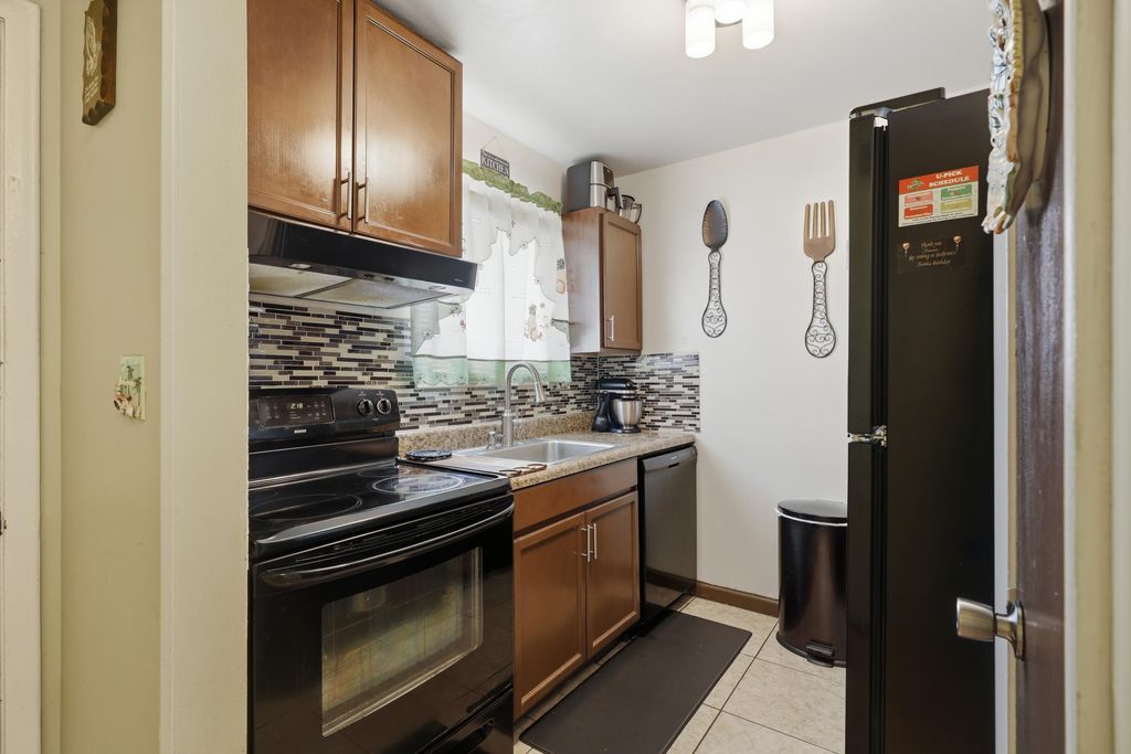 Photo of 6074 Forest Hill Boulevard #101, West Palm Beach, FL 33415 (MLS # B26026723)