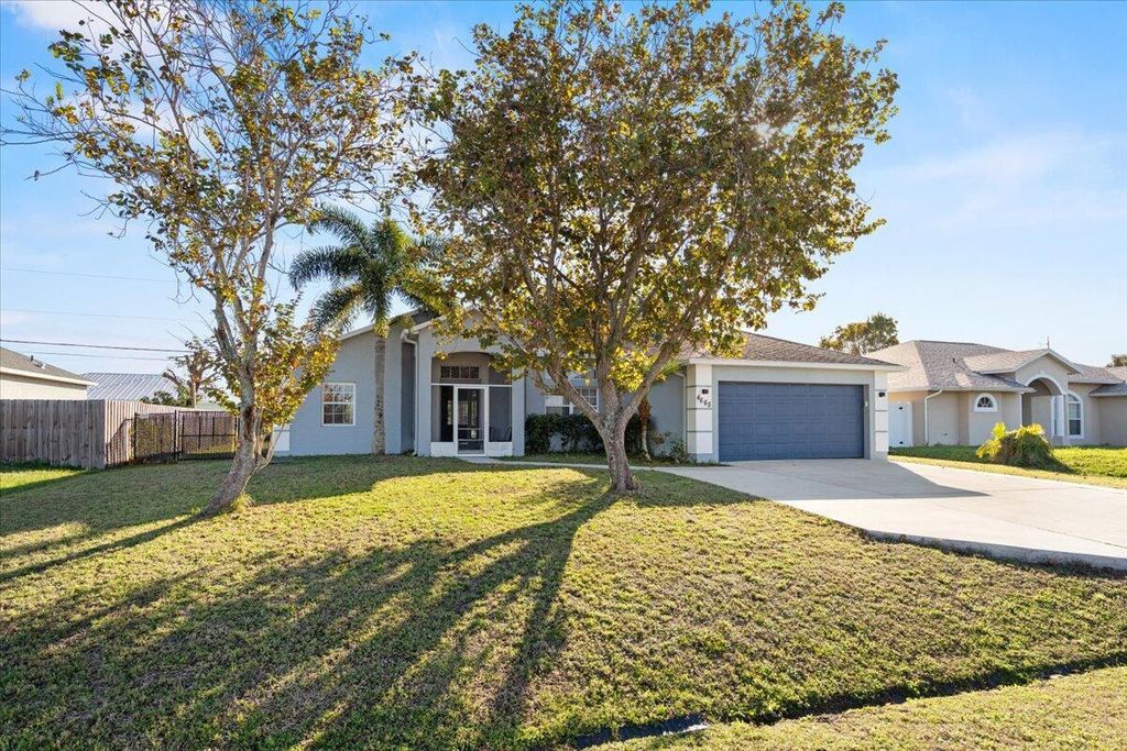 Photo of 4665 SW Rolfe Street, Port Saint Lucie, FL 34953 (MLS # R10955405)