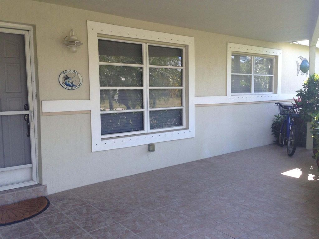 Photo of 2098 NE 4th Court, Boca Raton, FL 33431 (MLS # R11138669)