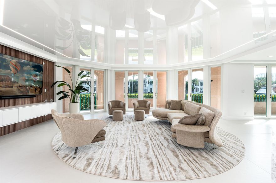 Water - Water - Water from every room!  Rare, Renovated Condo that feels like a private home.Prepare to be captivated by this truly stunning, Newly Re-imagined,Newly Renovated for the 2024/25 Season), Pet Friendly, East-facing 3 Bedroom + Media Room Condo boasting 2,772 sf of living space and wraparound 962 sf patio. (PRIVATE 50' BOAT SLIP, available but not included, 40 feet from your patio door).Located in Mizner Court, within the prestigious gated enclave of Mizner Village on the grounds of  The Boca Raton Resort & Club, this RARE (only 15 3BR's exist of 200 Total units), reconfigured three-bedroom (plus Media Room) residence features New Full Impact Hurricane Windows & Doors.